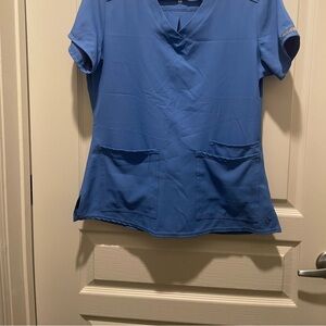 Light blue scrub size small, in great condition